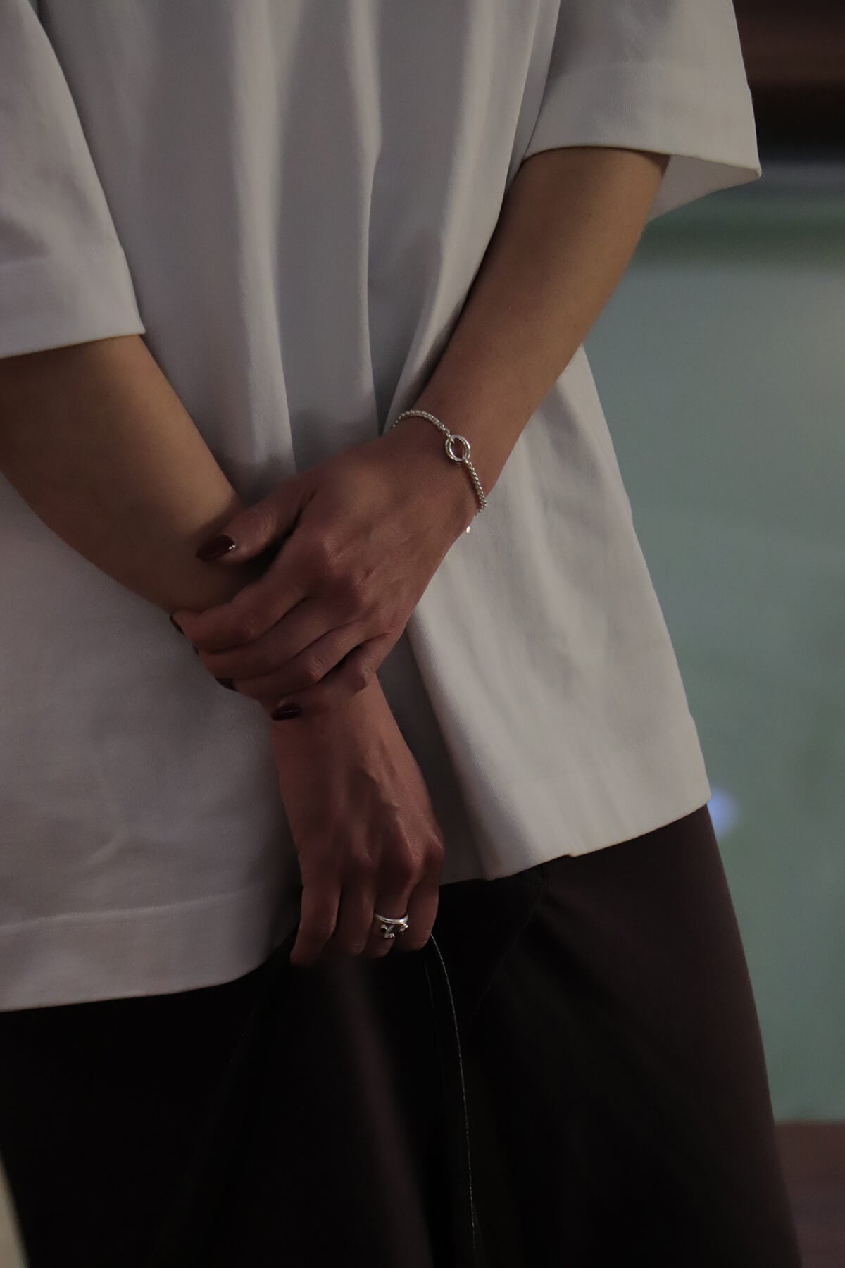 Magaly wearing Splash bracelet in silver with Splash ring at La Piscine Musée Roubaix.