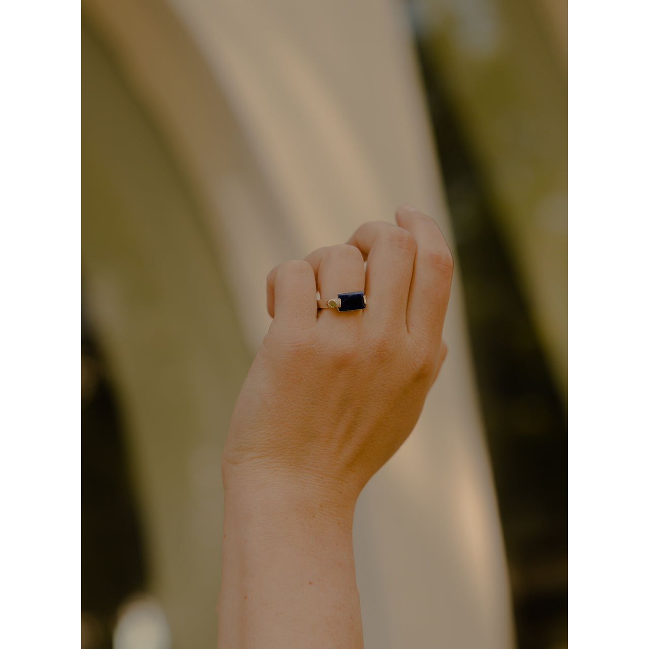 This ring effortlessly blends modern elements with the timeless allure of the blue sodalite stone.