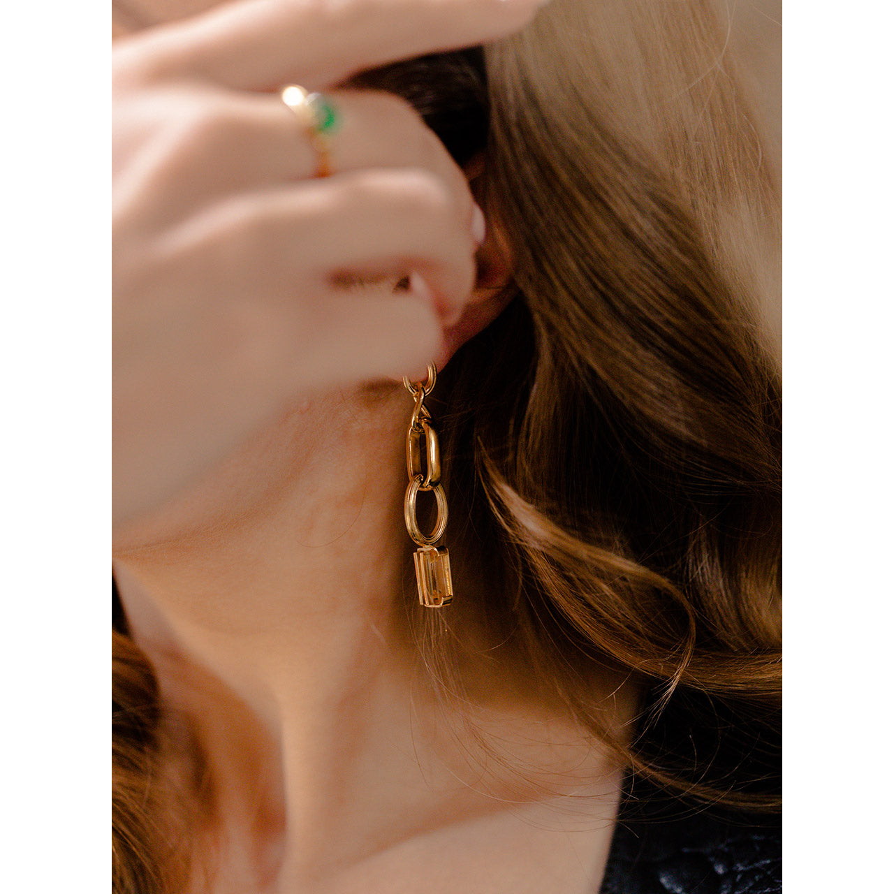 These refined long earrings are designed with a combination of four distinct chain links.