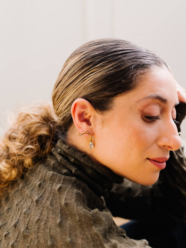 Twist earrings with blue sky topaz