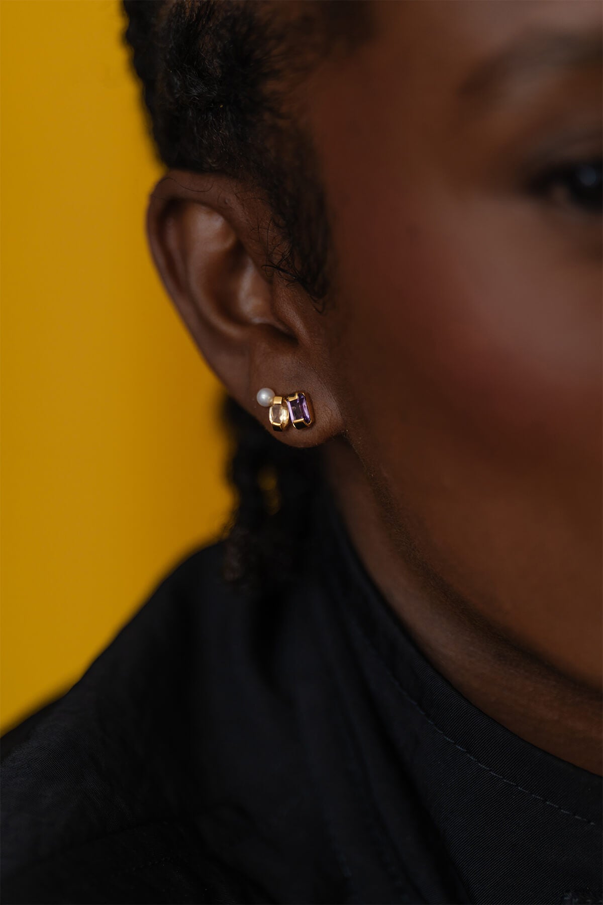 Minimalist cluster stud earrings with faceted amethyst, citrine, and pearl detailing for a refined but colorful accent.