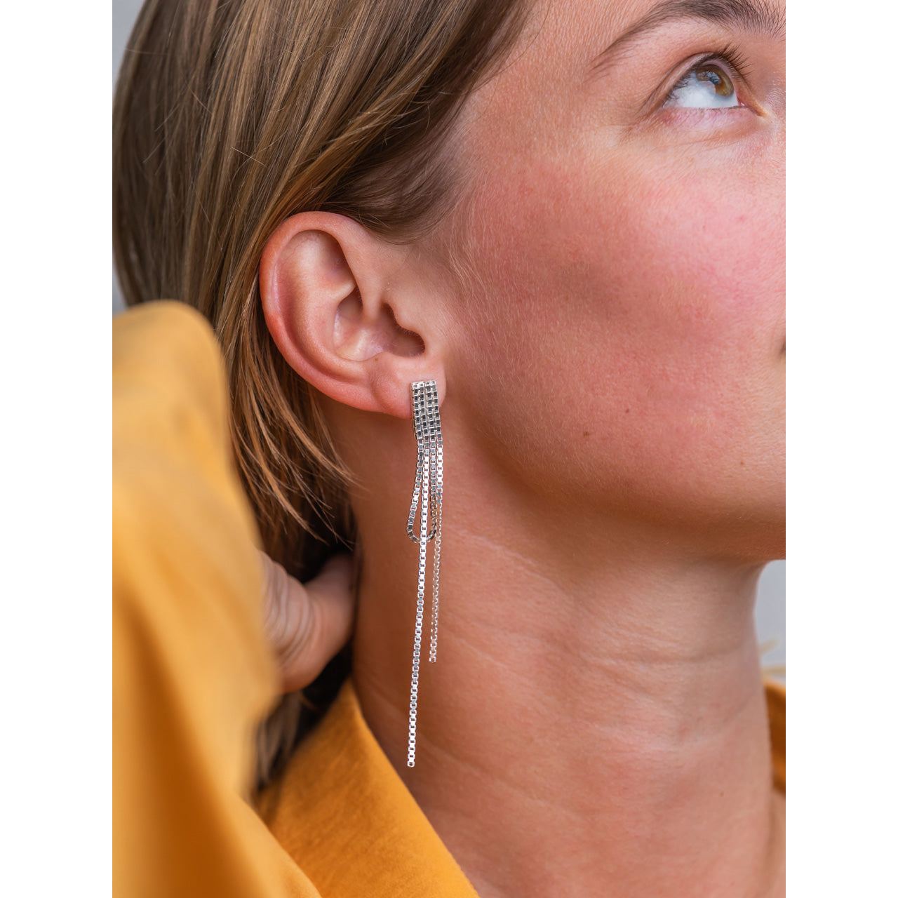 silver festive draped earrings