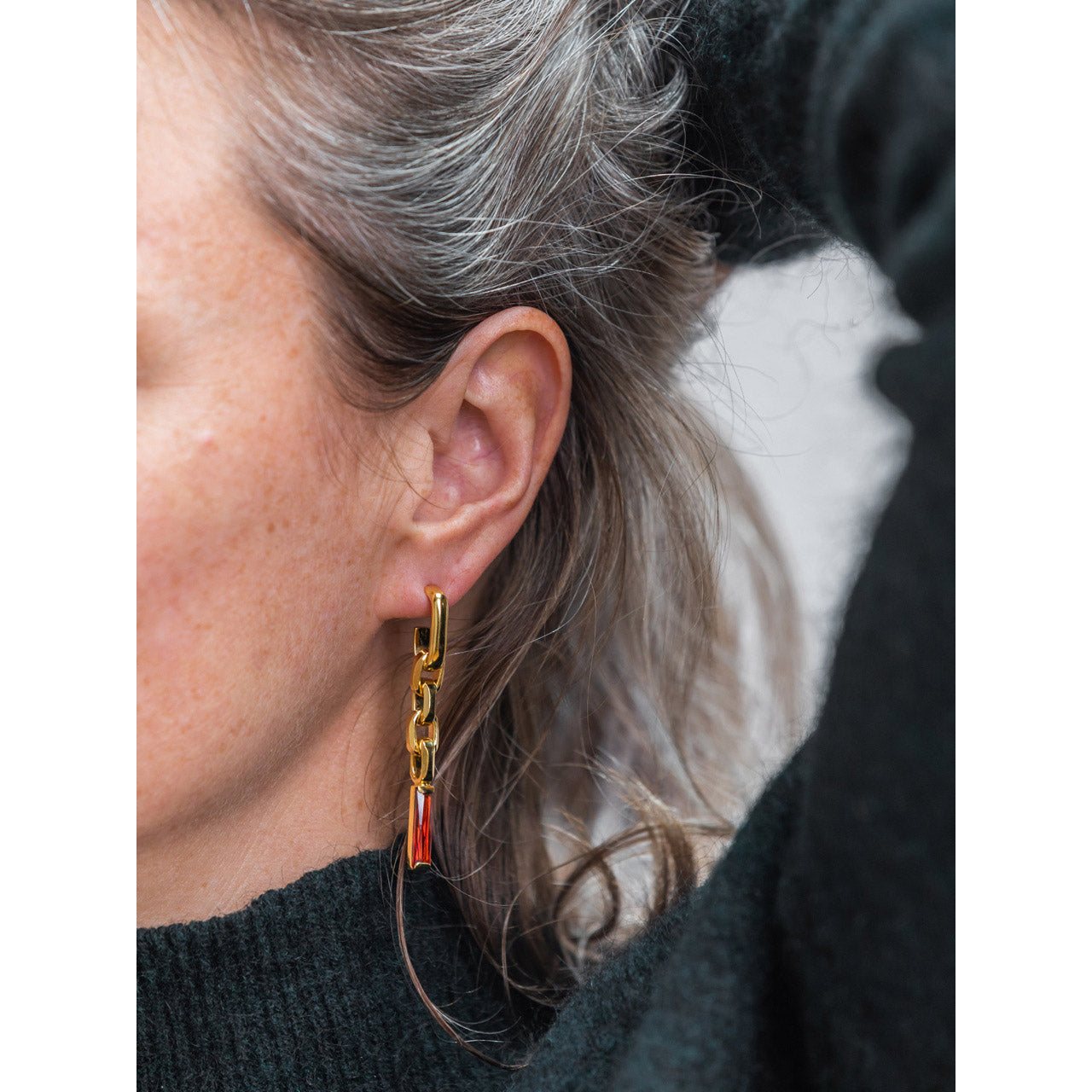 gold festive garnet statement earrings